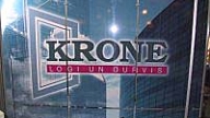 KRONE logi un durvis.