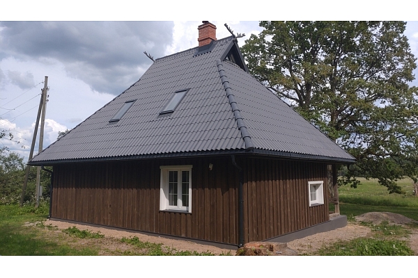 Koka mājas apdare